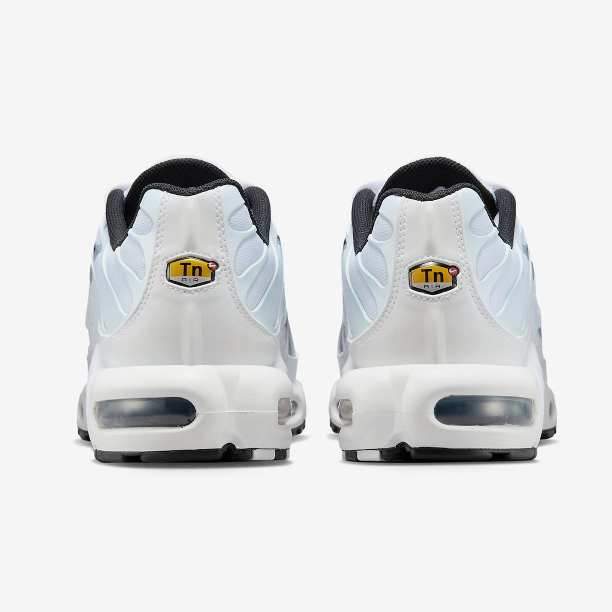 The nike air max top plus spray appears in